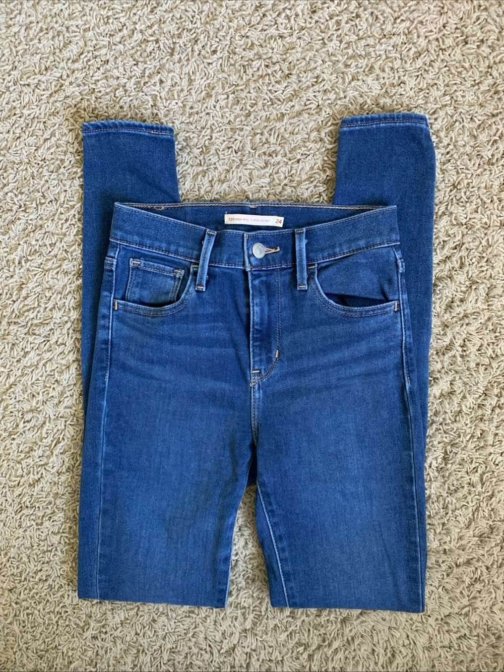 Levi’s 720 high rise super-skinny size 24 denim blue jeans